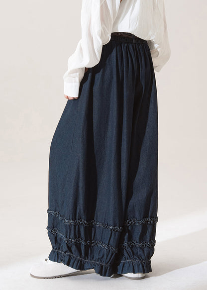 Vaqueros casuales de color azul oscuro con bolsillos con volantes oscuros para primavera