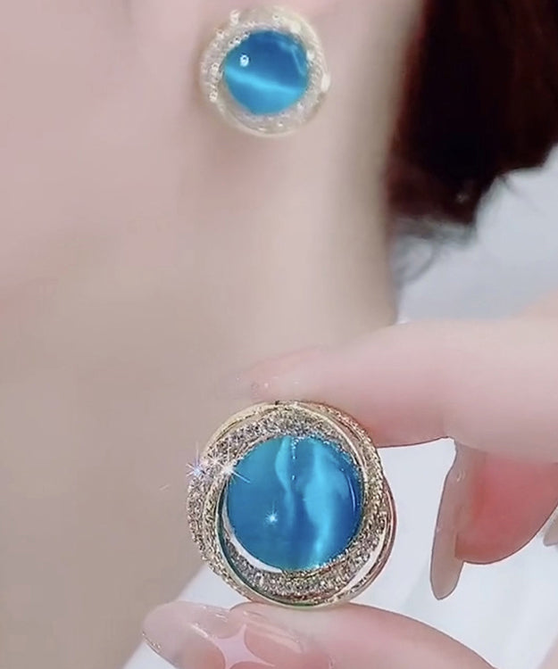 Pendientes casuales de plata de ley verde con circonita y ojo de gato