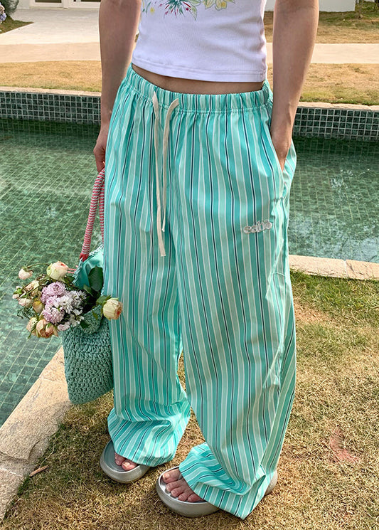 Pantalones casuales de algodón con cintura elástica y bolsillos a rayas verdes para verano