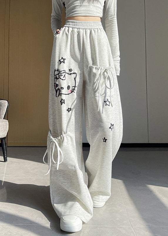 Pantalones casuales de algodón gris claro con cintura elástica y bolsillos estampados para primavera