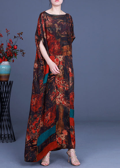 Lässiges orangefarbenes Patchwork-Maxikleid mit asymmetrischem Design im Herbst