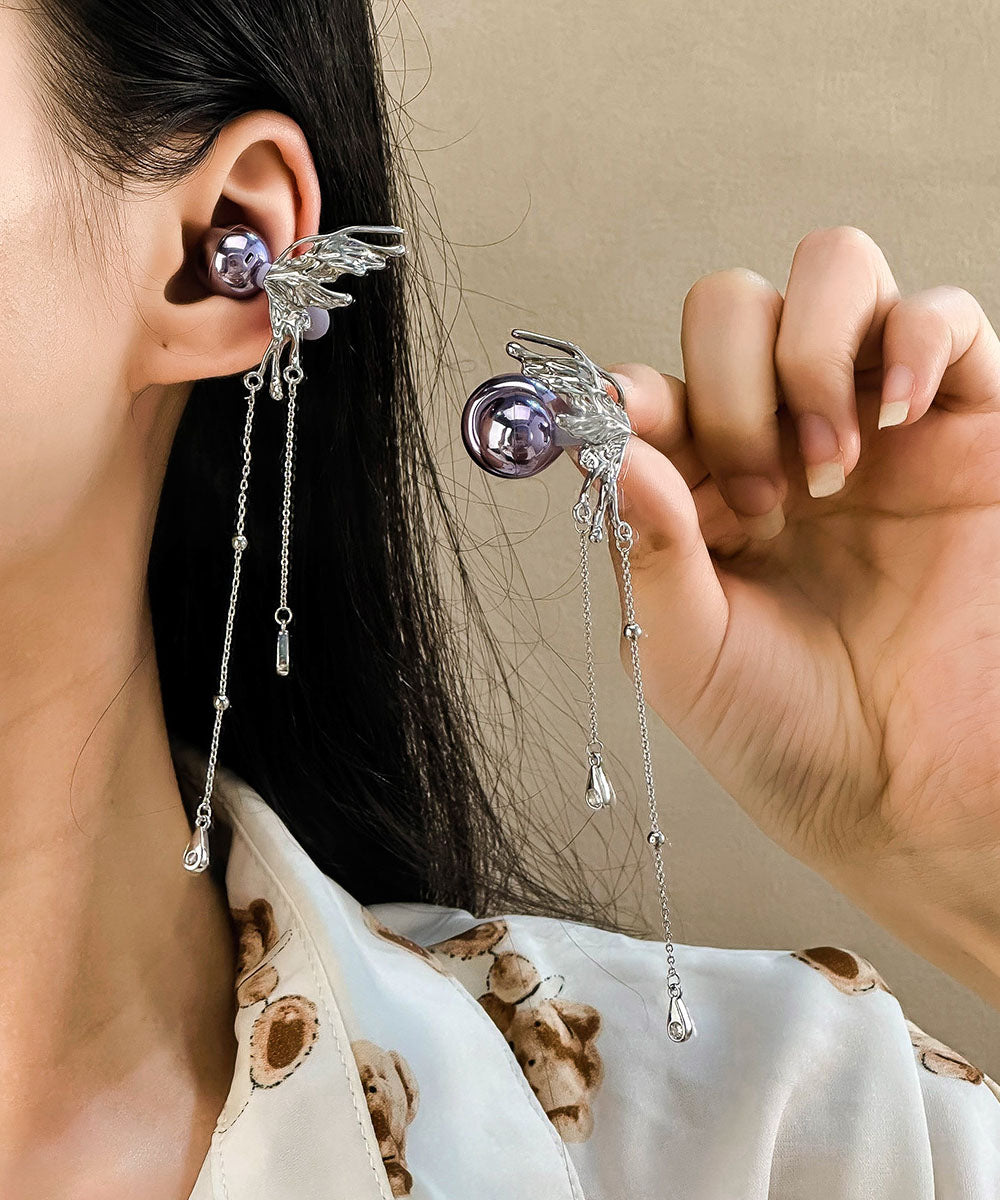 Pendientes casuales con borlas de mariposa de cobre y seda