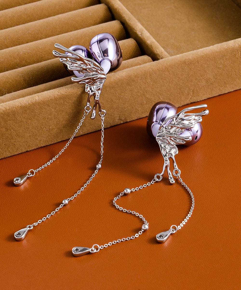 Pendientes casuales con borlas de mariposa de cobre y seda