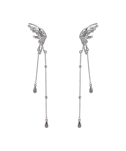 Pendientes casuales con borlas de mariposa de cobre y seda