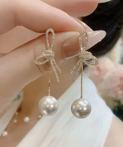 Lässige weiße Ohrringe mit Schleife aus Sterlingsilber