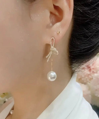 Lässige weiße Ohrringe mit Schleife aus Sterlingsilber