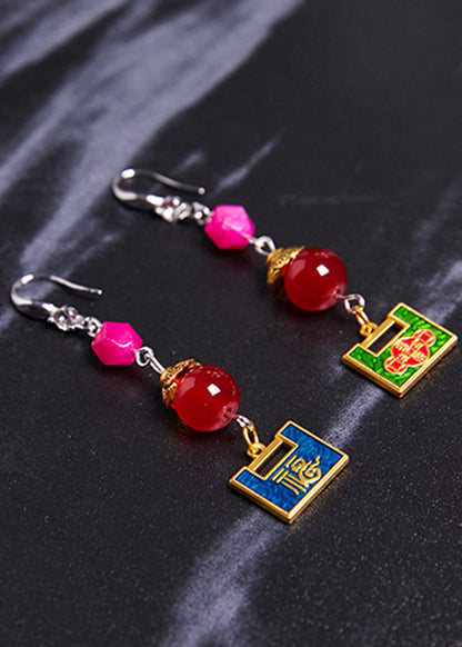 Pendientes colgantes de metal con candado dorado y diseño asimétrico elegante