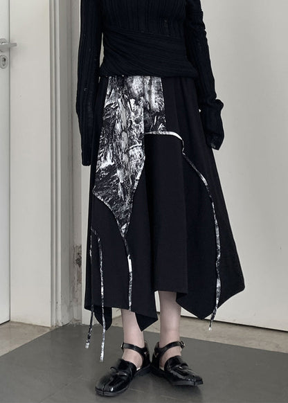Schicker schwarzer, asymmetrisch bedruckter Baumwollrock in A-Linie für den Frühling