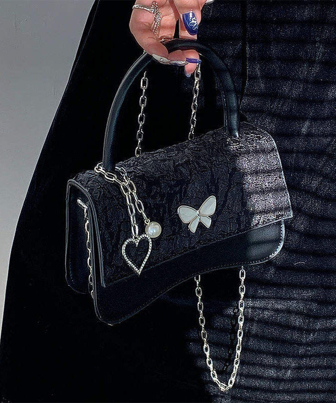 Minibolso elegante de piel sintética con diseño de mariposa negra y cadena