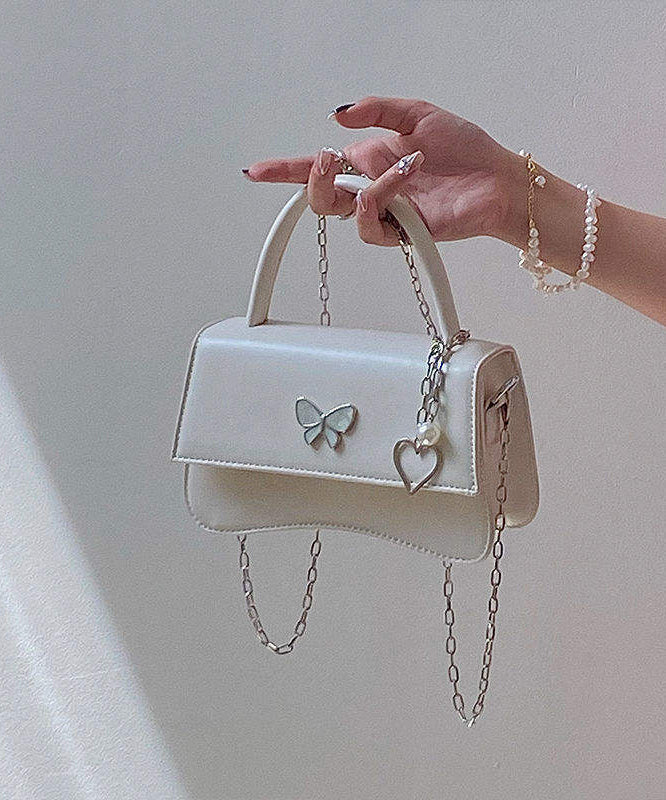 Minibolso elegante de piel sintética con diseño de mariposa negra y cadena