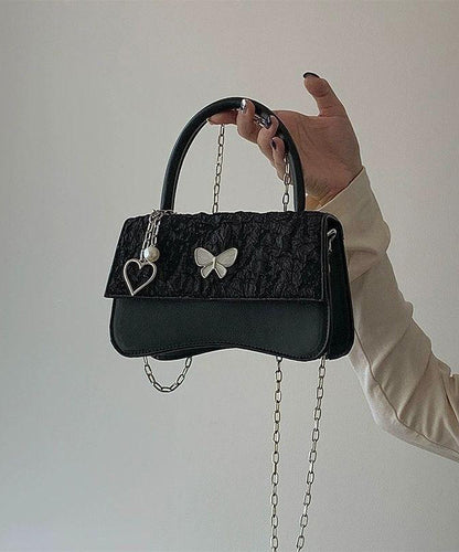 Minibolso elegante de piel sintética con diseño de mariposa negra y cadena