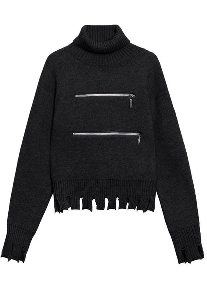 Schicker schwarzer Herbstpullover mit Reißverschluss und Quasten