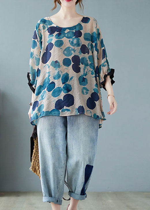 Schickes blaues Top mit asymmetrischem Design und Fledermausflügel-Ärmeln