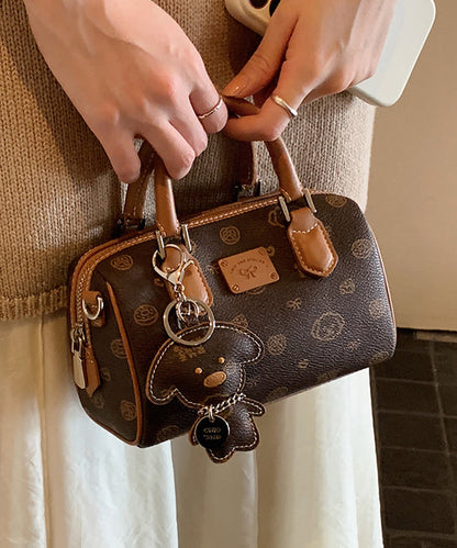 Bolso de mano elegante de piel sintética con estampado de dibujos animados en color marrón