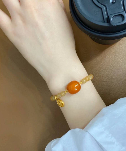 Pulsera elegante de cadena de calcedonia y cera de abejas en oro de 14 quilates con caramelo