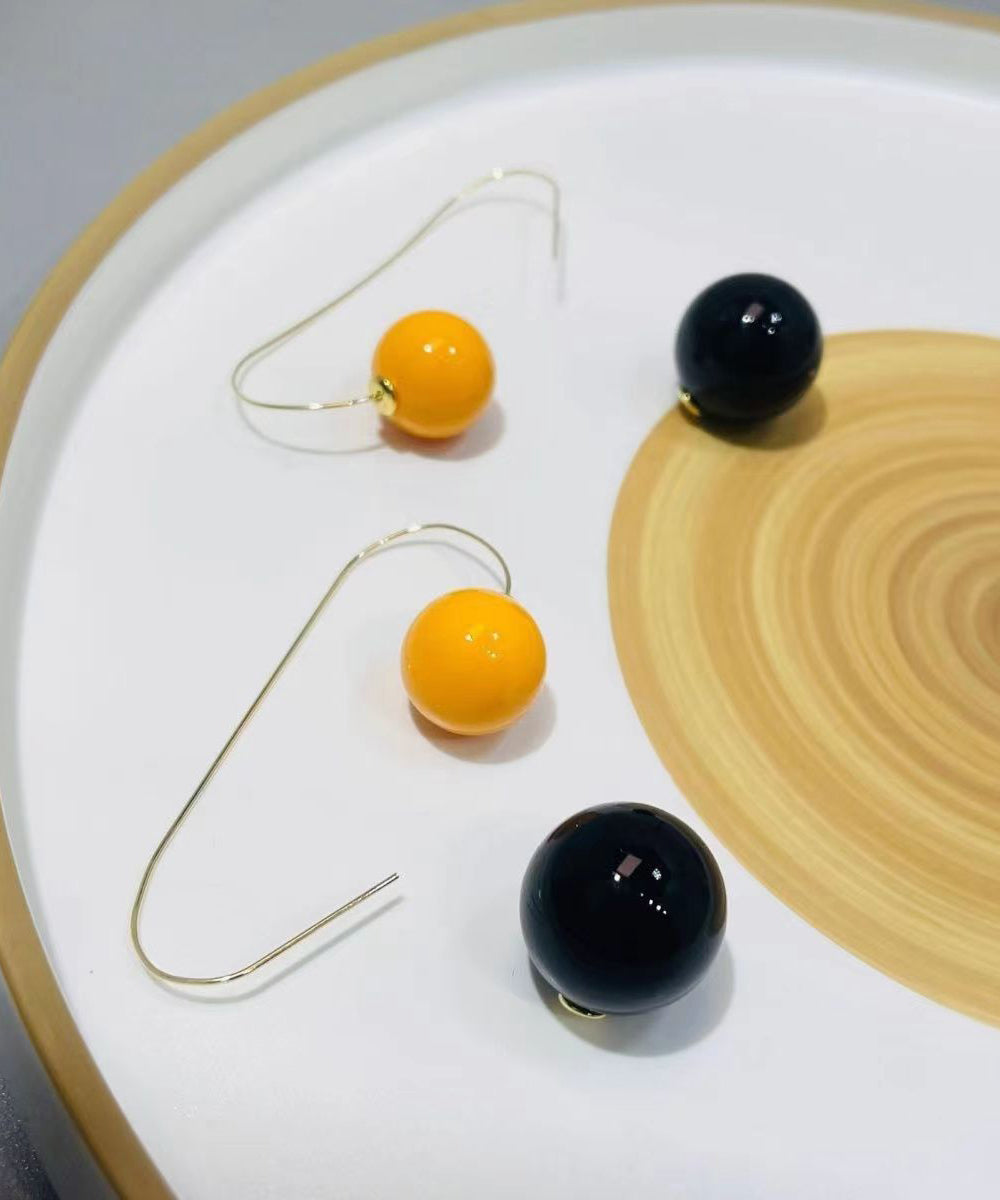 Pendientes elegantes de aro con bolas de resina de cobre y bloques de color