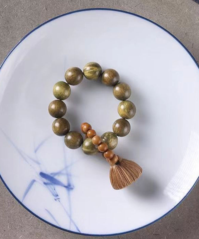 Elegante pulsera con borlas y cuentas Olivary Nucleus en bloques de color