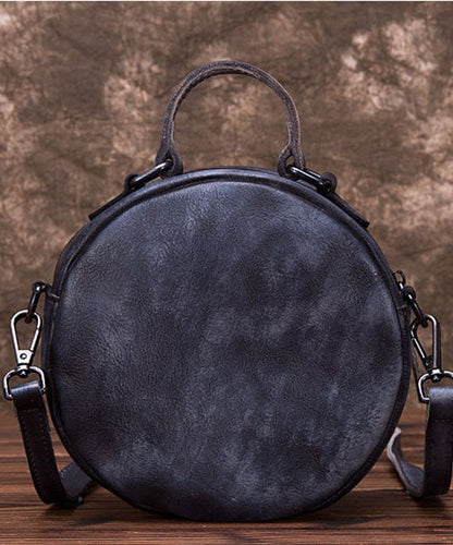 Schicke dunkelgraue Umhängetasche aus Leder mit Tier-Patchwork-Muster