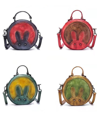 Schicke dunkelgraue Umhängetasche aus Leder mit Tier-Patchwork-Muster