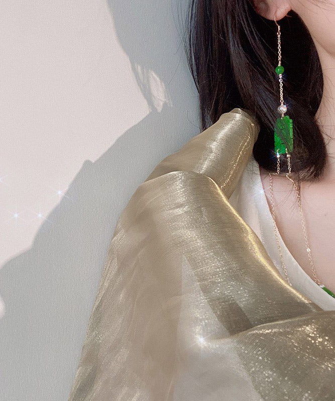 Schicke Ohrringe mit Jadeperlen und Quasten in trockener grüner Jade