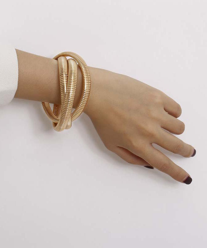 Chic Gold – Mehrlagiges Kettenarmband aus 18 Karat Gold