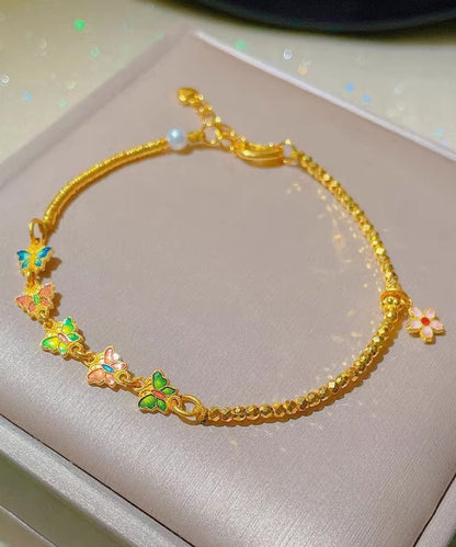 Schickes, antikes Cloisonné-Armband mit Blumenanhängern aus Gold