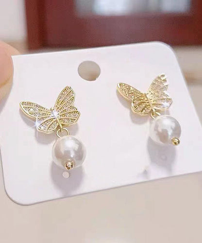 Elegantes pendientes de mariposa con perlas doradas y plateadas