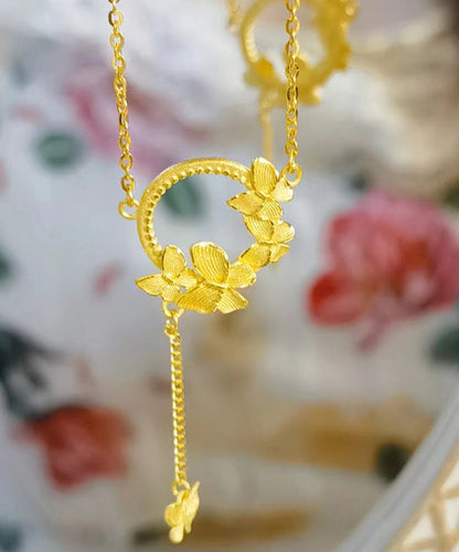 Elegante collar con colgante de mariposa y borla de acero inoxidable dorado