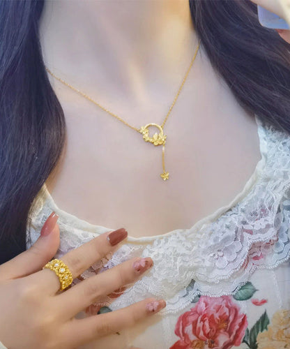 Elegante collar con colgante de mariposa y borla de acero inoxidable dorado