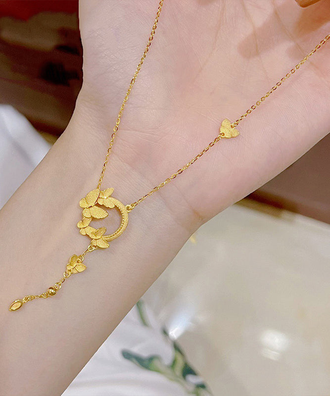 Elegante collar con colgante de mariposa y borla de acero inoxidable dorado