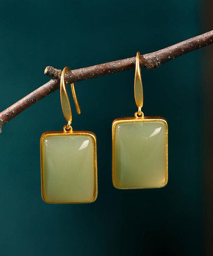 Elegantes pendientes colgantes de jade verde antiguo y dorado