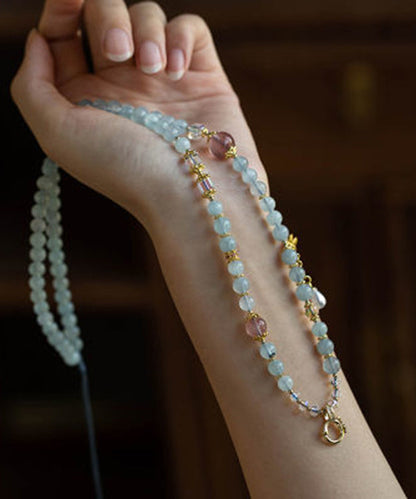 Elegante collar con borlas y cuentas de jade de aleación azul claro