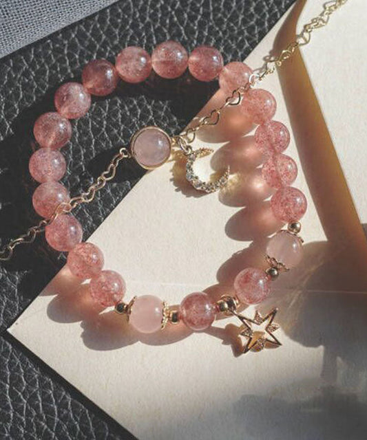 Pulsera elegante de oro rosa de 14 quilates con fresa, cristal, circonita, estrella y luna