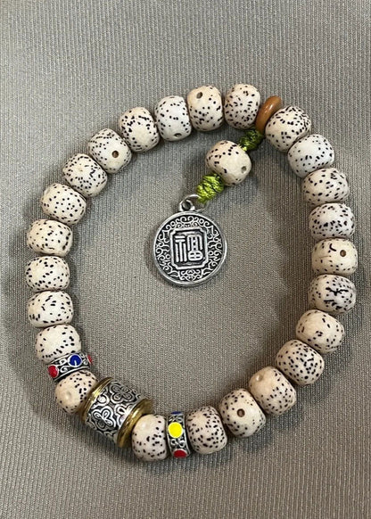 Chic Pipal Tree Seed Fu character Charm Bracelet