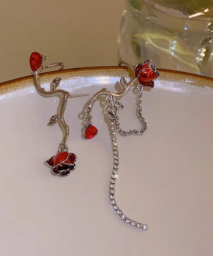 Pendientes elegantes con borlas asimétricas de aleación roja con cristales de circonita y goteo de aceite