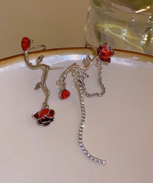 Pendientes elegantes con borlas asimétricas de aleación roja con cristales de circonita y goteo de aceite