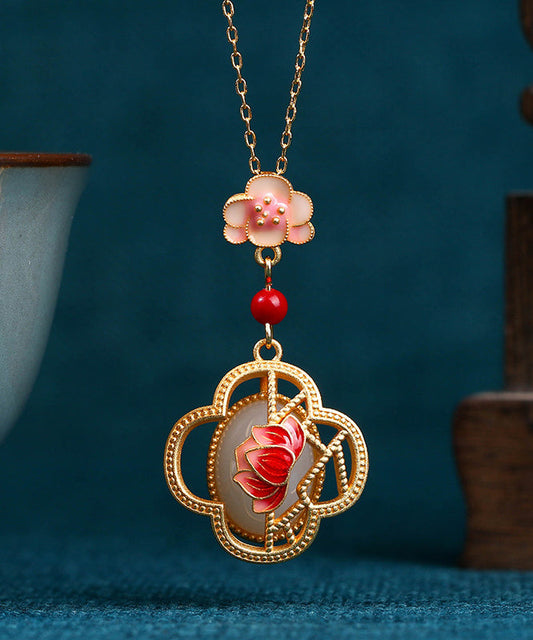 Schicke Halskette mit Anhänger aus Jade und Lotusblüte mit antikem Gold