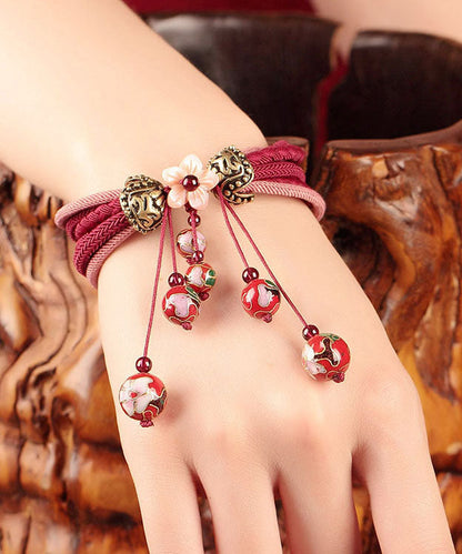 Schickes rotes handgestricktes Cloisonné-Armband mit Muschel-Blumen-Charme