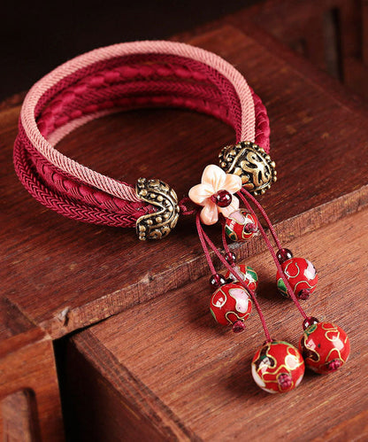 Schickes rotes handgestricktes Cloisonné-Armband mit Muschel-Blumen-Charme