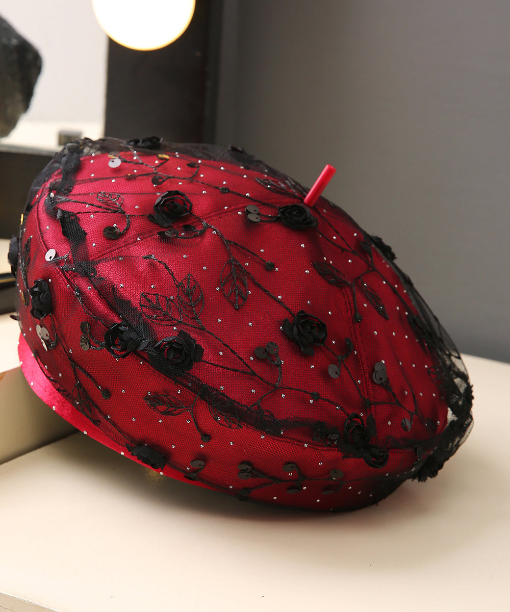 Schicke rote Pailletten-Baskenmütze mit Blumenmuster