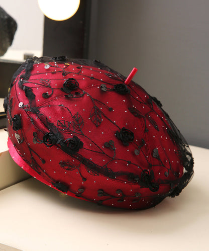 Schicke rote Pailletten-Baskenmütze mit Blumenmuster