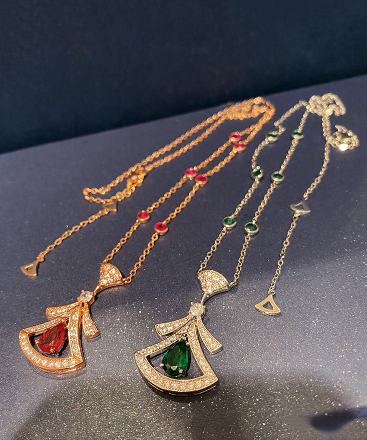 Elegante collar con colgante en forma de abanico de circonita y gema dorada de plata de ley roja