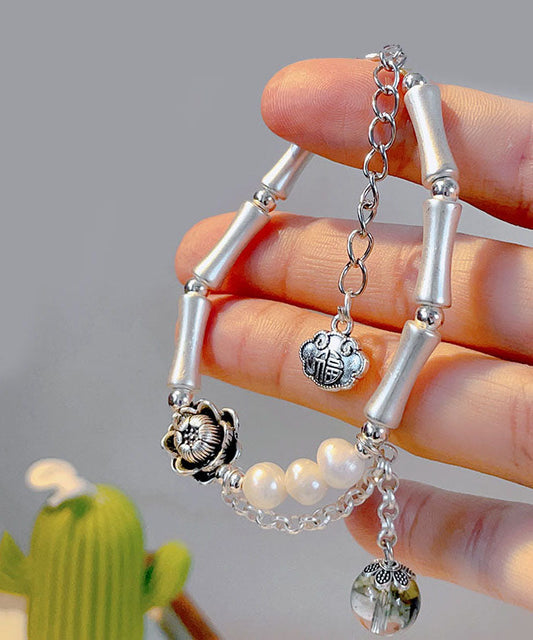Schickes Seidenarmband aus Sterlingsilber mit Perlen und Kristallen und Blumenmuster und Bambus-Charm