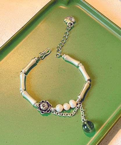Schickes Seidenarmband aus Sterlingsilber mit Perlen und Kristallen und Blumenmuster und Bambus-Charm