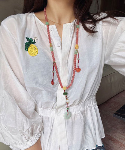 Collar elegante con colgante de cuentas de jade rojo agua y gemas de perla