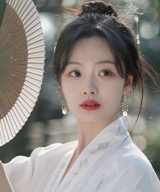 Schicke weiße antike Gold Jade Ping Schnalle Vögel Blumen Tropfen Ohrringe