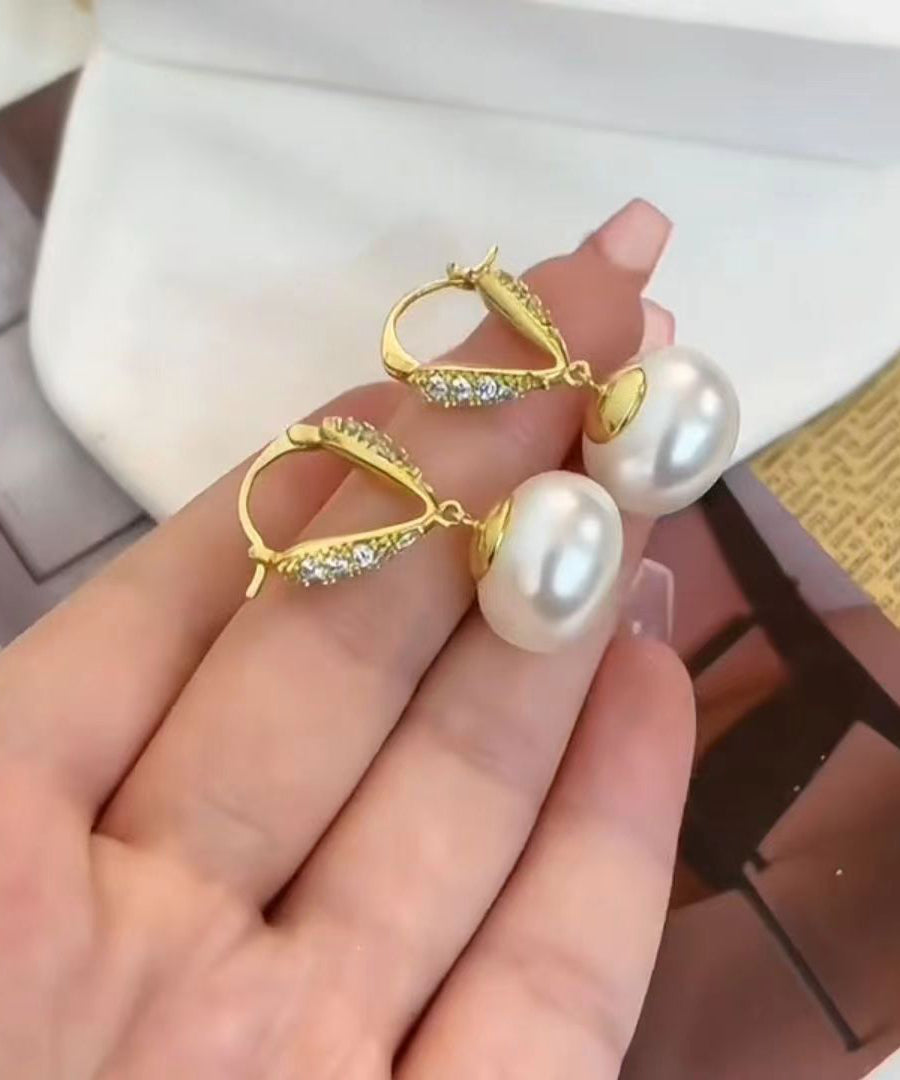 Elegantes pendientes colgantes de cobre blanco dorado con perla y circonitas