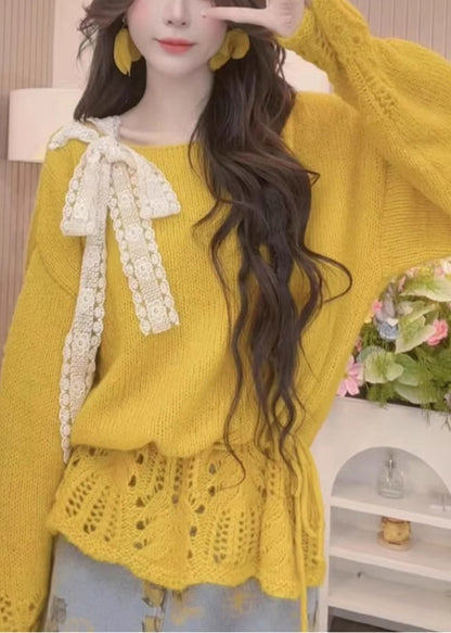 Suéteres de punto con lazo calado amarillo elegante para primavera