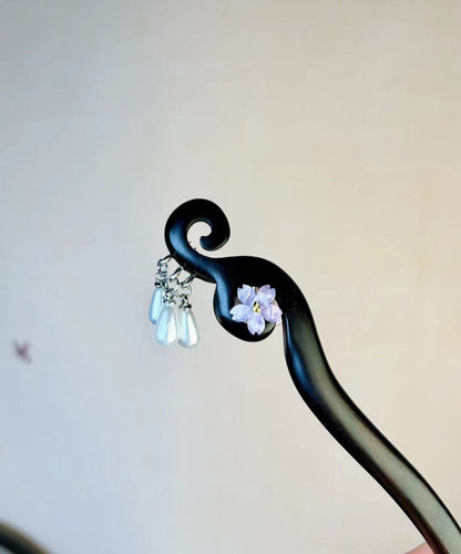 Horquilla de borla floral con perla de madera morada de estilo chino