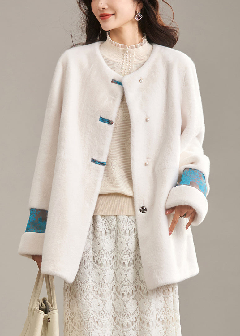 Eleganter beigefarbener Patchwork-Mantel aus Leder und Pelz mit Rundhalsausschnitt für den Winter